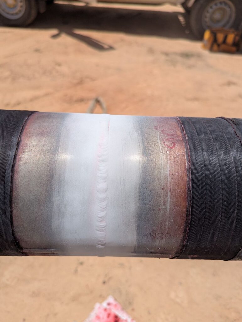Pipeline girth weld prepared for inspection